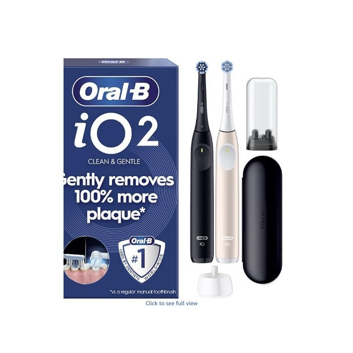Oral-B iO2 Duo black and pink electric toothbrushes with packaging and travel accessories